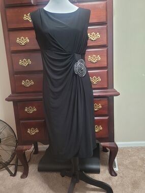 Tiana B. Black Sleeveless Midi Dress with Rosette Accent